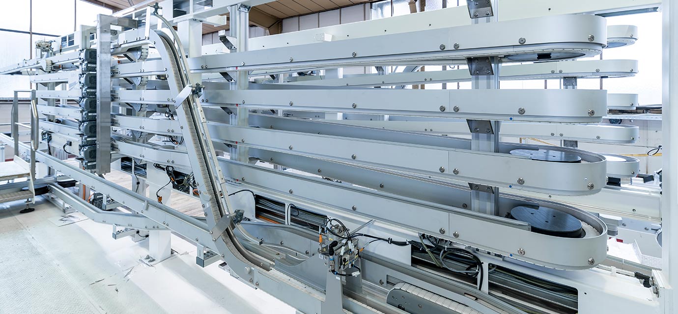 Alpine conveyor - Wendelförderer - Stauförderer von modular automation